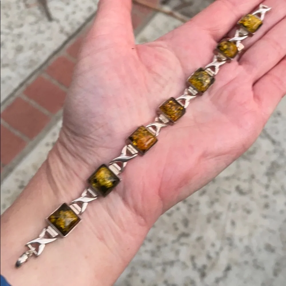 Antique sterling silver bracelet with green amber